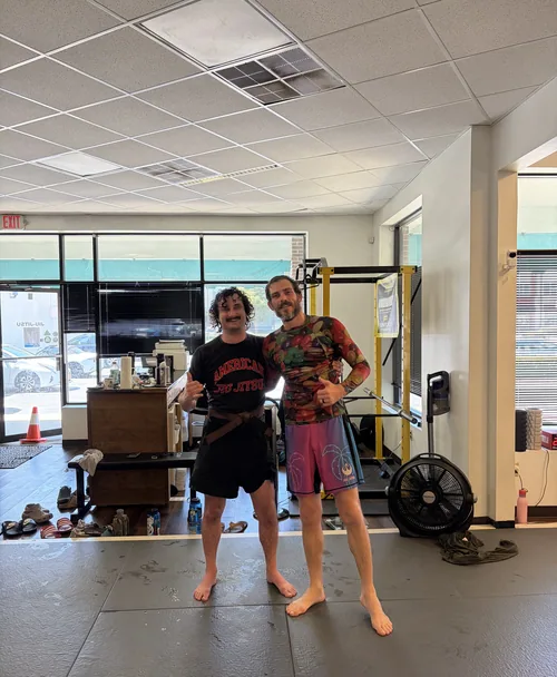 Two adult no-gi training partners at Clayton Phillips Jiu Jitsu in Norfolk